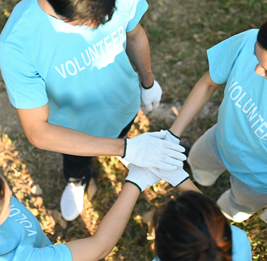 volunteers holding hands