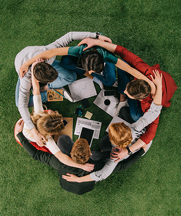 kids holding each other in a circle