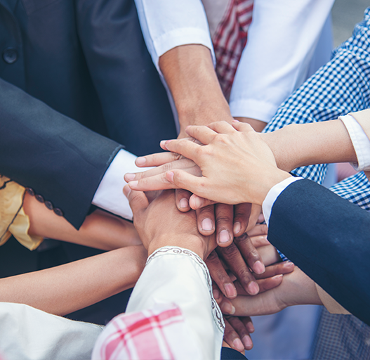 business owners holding hands